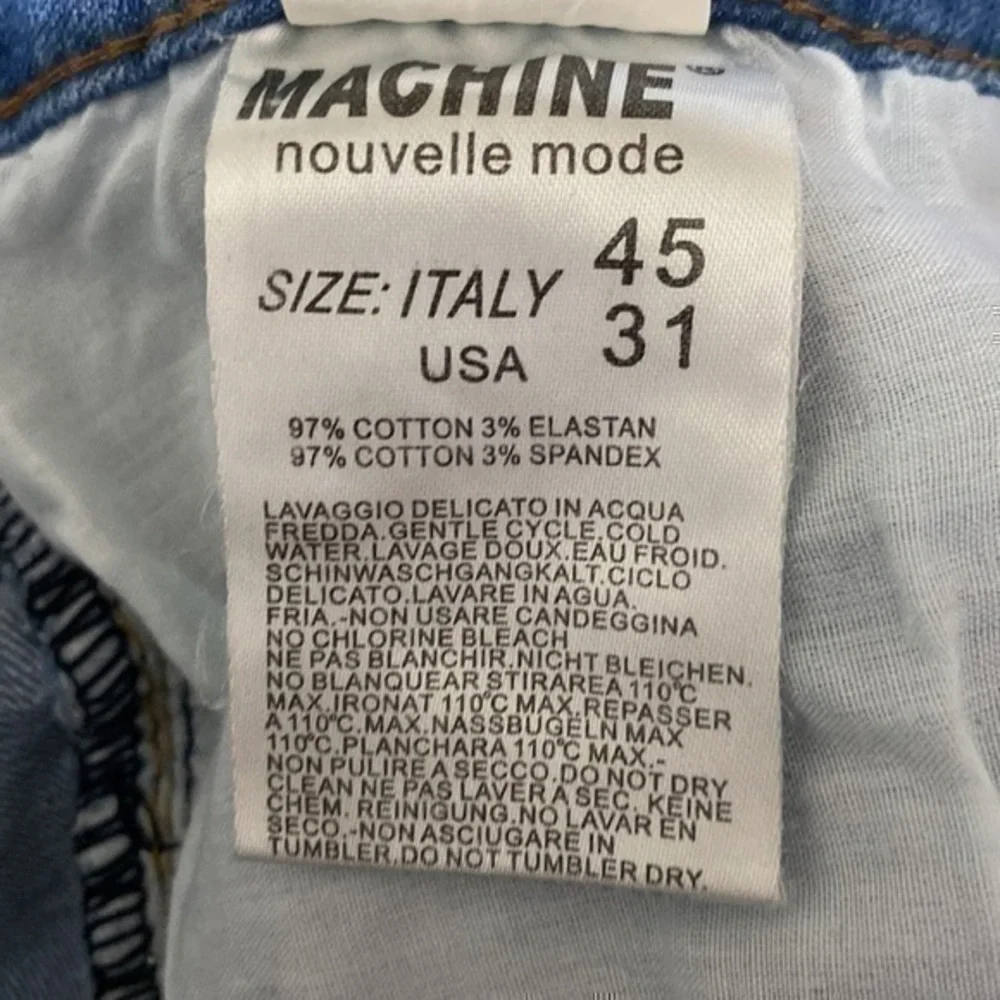 Machine light wash distressed mid rise skinny jeans!!
